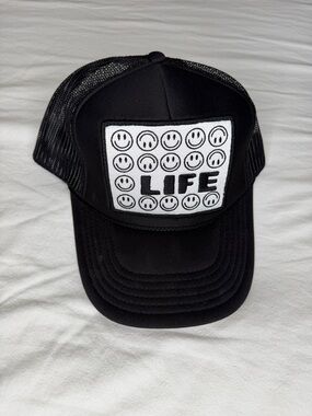 Black Trucker Hat with 'LIFE' Smiley Patch